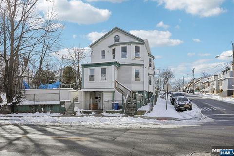 Photo of 123125 Belmont Avenue, Paterson, NJ 07522 (MLS # 25043606)