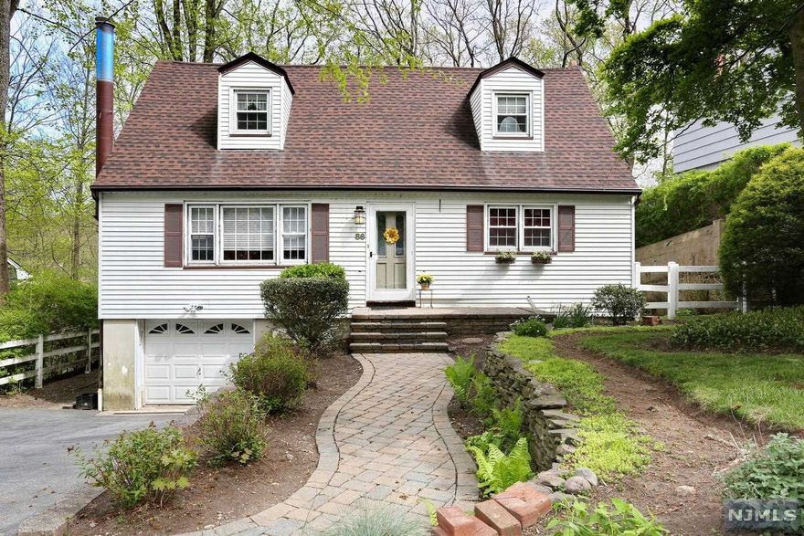 Come Fall in love with this beautiful home overlooking the Ramapo River! Imagine sitting on the deck while enjoying nature and views of the River! Hardwood floors greet you into this open concept home. Living room with wood burning stove and large windows. Fabulous kitchen with granite countertops and SS appliances opens to Dining Room with a slider to deck. Neutral 1st floor full bathroom and 2 Bedrooms complete this floor. 2nd floor has 2 generous size BRs and a full hall bathroom. Basement is finished with a family room, storage and laundry. Great schools, a wonderful community--Come enjoy everything this home has to offer!