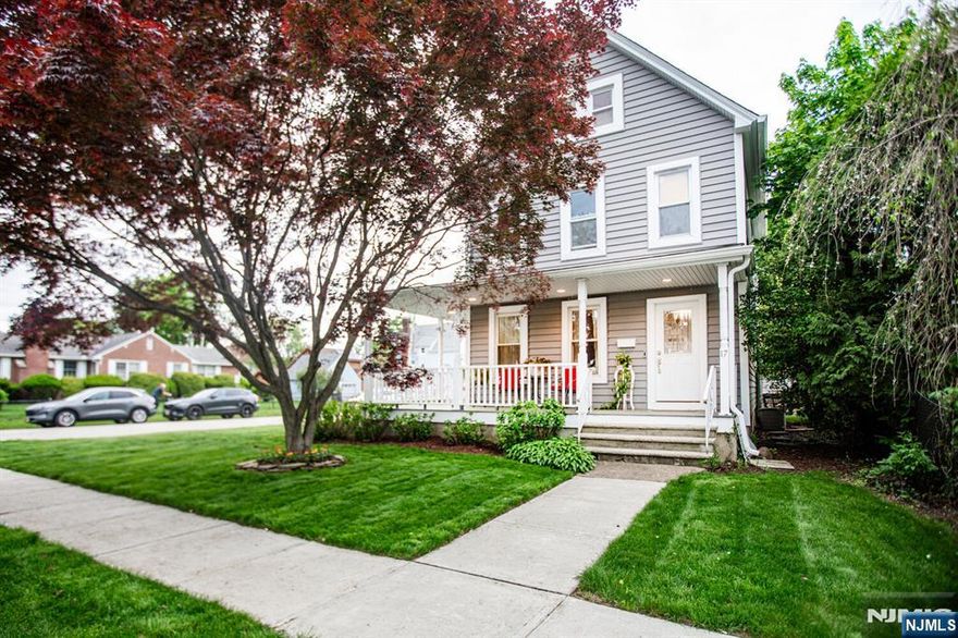 This is the kind of home that makes you happy to be around. Renovated with entertaining at the forefront. Welcoming right from the sidewalk, a wraparound lemonade porch, comfort food for the soulâ€¦ You really feel the dramatic high ceilings upon entry. Massive, bright kitchen open to the dining room showcasing an elegant Victorian bay window with stunning trim detail. So much space in this kitchen, anyone could be organized. A back deck that extends the living/entertaining space even further... Powder room perfectly placed by the back door. A warm living room with those stunning extra long windows and Victorian molding round out the first floor. The second floor has three bedrooms and a full, beautifully appointed, crisp bath with a linen closet. Up a level, an architecturally stunning bonus room with a spacious storage closet. The basement, currently used for laundry and storage is a blank canvas, large and open- home office, playroom, gym, art studio, yoga- here is where you can make your mark. New roof and siding, pride of ownership in and out. Oversized one car detached garage, mature landscaping, flower bedsâ€¦ A real neighborhood nestled at the foothills of the Ramapo Mountains close to hiking trails, major highways, shopping, parks, great schoolsâ€¦This home in this neighborhood is a true Bergen County gem.
