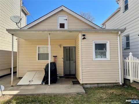 Photo of 8284 Maple Ave, Wallington, NJ 07057 (MLS # 26007704)