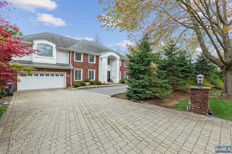 LOCATION LOCATION LOCATION!! INCREDIBLY RARE 3/4 ACRE (approx.) FLAT PROPERTY ON ONE OF ENGLEWOODS MOST DESIRABLE STREETS. FULLY RENOVATED AND EXPANDED 10 YEARS AGO THIS CENTER HALL COLONIAL HAS A MAGNIFICENT CHEFS KITCHEN & TOP OF THE LINE APPLIANCES. BEAUTIFUL CENTER ISLAND AND OVERSIZED BREAKFAST ROOM WITH DOOR TO TERRACE AND SUMMER KITCHEN. SECOND FLOOR OFFERS LARGE LANDING/STUDY AREA, 5 LARGE BEDROOMS & 5 FULL BATHS. THERE ARE 2 ADDITIONAL ROOMS ON THE THIRD FLOOR. FULLY FINISHED & EXPANDED BASEMENT AFFORDS ANY BUYER AN OPPORTUNITY FOR EXTENDED ENTERTAINING. OUTDOOR RECREATION AREA IS UNPARALELED WITH OPEN AIR KITCHEN & TENNIS/SPORT COURT. LOCATED CONVENTIENLY TO SCHOOLS, PARKS, HOUSES OF WORSHIP,TRANSPORTATION AND 5 MIN TO GEO. WASHINGTON BRIDGE AND ALL MAJORS HIGHWAYS. BEING SOLD IN AS-IN CONDITION.