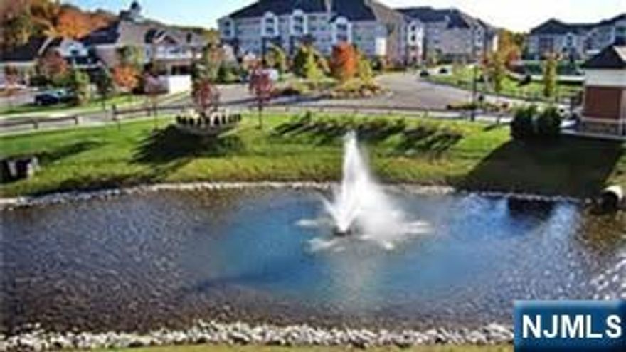 TOP FLOOR W/MT VIEW & DEEDED GARAGE in premier 55+ community where luxury, comfort, & convenience come together seamlessly. Ideally located just steps from the clubhouse, this spacious top-floor 2 bedroom, 2 bath residence offers thoughtful design & elegant living throughout. The bright eat-in kitchen provides ample space for a table & chairs. Large utility room offers abundant storage with a conv. located washer/dryer. French doors just off the formal DR open to a versatile den â€” ideal as a cozy family room, home office, or guest space. The inviting LR filled with natural light & feat SGD that lead to a covered balcony â€” the perfect spot to enjoy morning coffee while taking in the mountain views or relaxing at day's end. The primary suite is a peaceful retreat, highlighted by a tray ceiling and a spacious WIC. The spa-inspired en-suite bath incl walk-in shower w/built-in seat, double vanity sinks, and private water closet. A full-time director oversees 40+ social clubs & excursions - something for everyone. Indulge in the wealth of amenities: clubhouse, fitness center, steam/sauna rooms, indoor/outdoor pools, arts/crafts studio, movie theater, library, walking & biking trails, bocce ball, tennis courts, restaurant, card room, ballroom, billiards, and more. Don't let this opportunity pass you by experience the unrivaled lifestyle that this exceptional condominium has to offer. New hot water heater will be installed. Move right in and start enjoying the lifestyle you deser