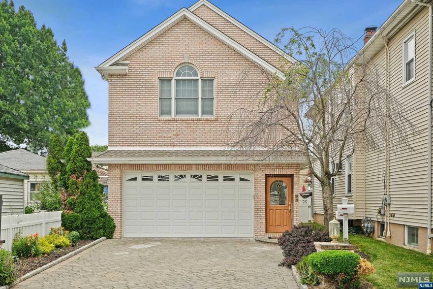 Location, Location! Commuters Dream! Nestled in the highly-sought after Botany Village section of Clifton sits this impeccable FULLY BRICKED, MULTI-FAMILY home recently built to include all the FINE details with stunning quality craftsmanship throughout, DRENCHED in Natural sunlight the moment you turn-key & open! Upper Level Unit feat. an open concept DESIGNER layout with Vaulted Cathedral Ceilings w/ Custom Crown Molding, Wainscoting & skylights throughout. Open Concept Kitchen with Premium SS appliances feat a Viking Stove & Sub-Zero Fridge. This unit feat. 3 bedrooms, 1 full bath with GLEAMING HW floors throughout, garage access and separate basement access. The First FL. unit has its own side entrance with same quality craftsmanship throughout feat. an open kitchen with flow to the living and dining area feat. 1 bedroom, 1 full bath with separate storage room and basement access! Bonus: Deep Yard & Near Major Transportation, buses, train & houses of worship. A TRUE MUST SEE!