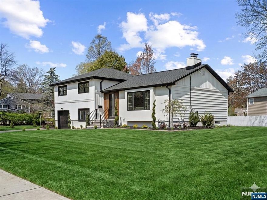 Welcome to this stunning 4-bedroom, 3-bath home in the sought-after Radburn section of Fair Lawn. Featuring herringbone hardwood floors and exquisite custom woodwork throughout, this home offers both character and modern elegance. The gourmet kitchen is the centerpiece, highlighted by an oversized Taj Mahal quartzite island, perfect for entertaining and everyday living. A cozy fireplace enhances the inviting living space, while spacious bedrooms and well-appointed baths provide comfort and flexibility. Located in one of Fair Lawnâ€™s most desirable neighborhoods, enjoy access to top-rated schools, beautiful parks, and Redburn's unique community setting. Convenient to NYC transportation, shopping, dining, and major highways, ideal for commuters. A rare opportunity in a prime location!!