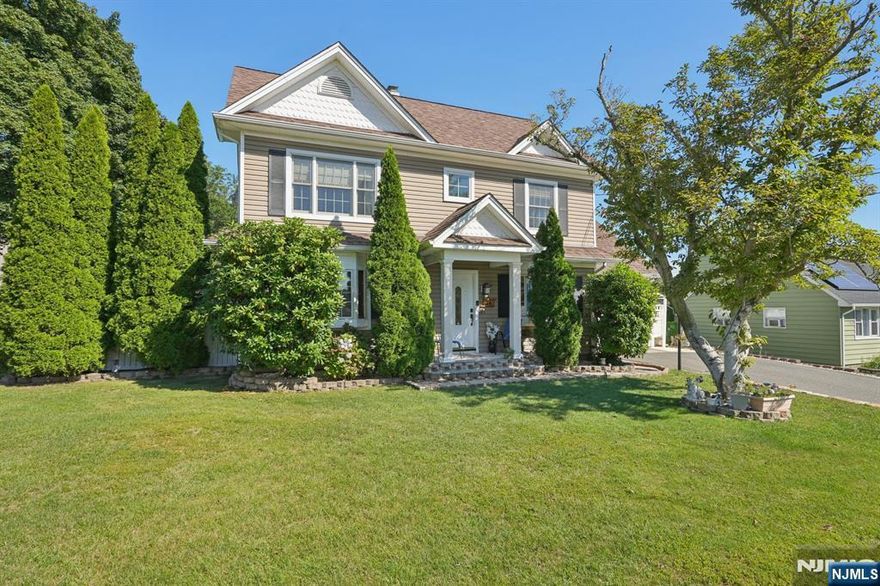 Location, Location, Location! This charming and expanded home offers space, style, and convenient 3 minute walk to the park and public transportation to NY City. Spacious 2010 addition adds modern flair, highlighted by a beautifully updated kitchen w/stainless steel appliances & radiant heated floors. The first floor features two bedrooms, a large formal dining room, and a cozy living room with a gas fireplace and built-in bookshelves. Updated bathrooms, a breezeway, and a deep 1-car garage with opener complete the main level. Upstairs, you'll find a stunning great room with vaulted ceilings and a fireplace mantle, along with a private primary suite that includes a walk-in closet and full bath with radiant heat. A versatile fourth bedroom or office is also located on this level, with a walk-up attic offering exciting potential for an additional bedroom and bathroom. The finished basement expands your living space with a family room, bar, gym/music room, and a full bath featuring a relaxing Jacuzzi tub. Enjoy outdoor living in the large, level, fully fenced backyard, complete with a deck, above-ground pool & fire pit, perfect for entertaining or unwinding! Additional highlights include 2-zone forced hot air heating, Central air, Radiant heat in the kitchen and primary bath. Close to shopping, schools, dining, major highways and more!