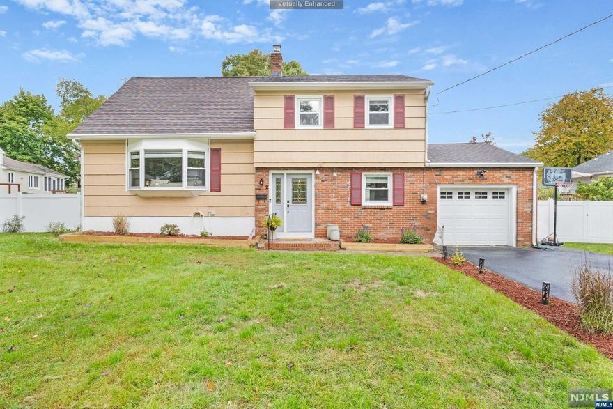 Move right into this newly renovated, Spacious Split Level Home in the highly desired town of West Caldwell. Situated on .3 acres there are a ton of expansion possibilities. This home has abundant natural light, gleaming hardwood floors, crown moldings and upgrades throughout. Kitchen is less than a year old with updated appliances, granite countertops, breakfast bar and sliding doors to deck. Large, bright living room flows right off the formal dining room. Lower level has a family room and renovated half bath. New Oak hardwood floors throughout. 2 generous bedrooms with a full bath on the 2nd floor and the 3rd floor has a spacious master with double closets and renovated en suite. This home is minutes to town and all schools. Must see home!