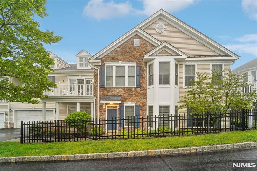 Welcome to this beautifully maintained 2-bedroom, 2.5-bath interior-unit townhouse in Four Seasons at Grandview, a vibrant 55+ gated community. As the largest Villa-Style Home, the SYRAH offers spacious, elegant living. Enjoy a sunlit layout with a formal dining room, glass-enclosed den, and a cozy living room with gas fireplace. The updated kitchen features custom cabinetry, marble countertops, stainless steel appliances, and a breakfast nook. The primary suite includes a walk-in closet and en suite bath, while the second bedroom adds flexibility. Additional highlights include hardwood floors, laundry room, storage, powder room, and a 2-car garage. Resort-style amenities include a 25,000 sq ft clubhouse, indoor/outdoor pools, fitness center, billiards, tennis, bocce, and walking paths. Enjoy maintenance-free living with a full calendar of social events. Donâ€™t miss this opportunity for comfort and community in an exceptional home!