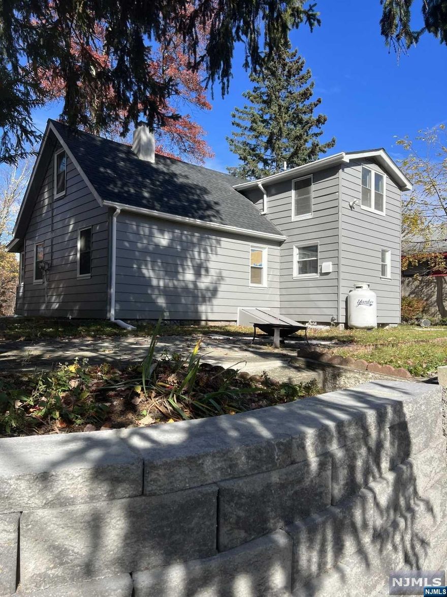 This beautifully renovated 3 story custom home boasts 4 beds and 1.5 bathrooms designed with exceptional craftsmanship and quality upgrades throughout. Includes natural stone, hardwood, porcelain tiling, & countless beautifully detailed finishes. Upon entering, you are met with an optimal floor plan, a oversized master bed, and a spacious great room/living room. Recent interior renovations include new SS appliances, dishwasher, washer/dryer, hardwood flooring, & a newly installed efficient central air + heating unit. Features 3 entrances, spacious yard, outdoor seating area, & easily accessible driveway with ample parking. All this on your own corner lot, directly across from Upper Greenwood Lake (which is large, stunning, & motorboat accessible!) Property is just a few minutes from UGL's beach, boat launch, and clubhouse w/ year round events, activities, & entertainment and more! Close to major transportation to NYC. Optional membership fees apply if desired *Photos Coming Soon*