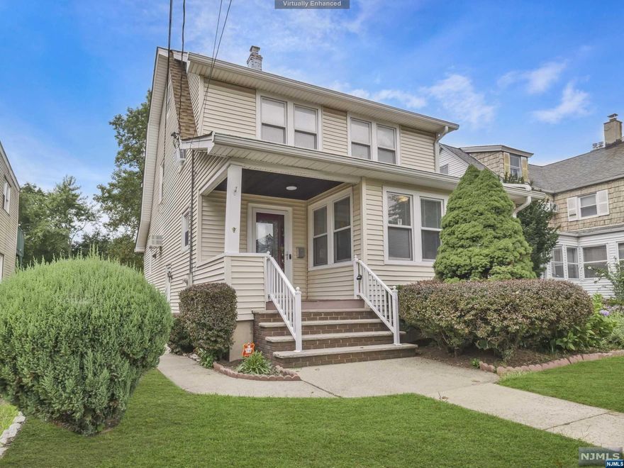 Charming and well maintained Colonial home on level property and move-in ready! Greet your guests in the entry foyer, which leads to living room and sun porch with large windows allowing plenty of natural light. Spacious formal dining room is perfect for hosting holiday gatherings or quiet meals at home. The dining room opens to the kitchen, which offers stainless steel appliances, plenty of cabinetry, storage and separate dining area overlooking the rear deck. Hardwood floors throughout first floor. Second level offers 3 bedrooms and tastefully decorated full bathroom with tub/shower. One bedroom offers access to walkup attic with plenty of storage space. Current owner is using railroad style bedroom as a 4th bedroom. Full finished basement offers laundry room, powder room and plenty of space for a family room, home gym or home office. One car width private driveway. Level rear yard offers plenty of space for all your outdoor fun. Conveniently located near stores, restaurants.