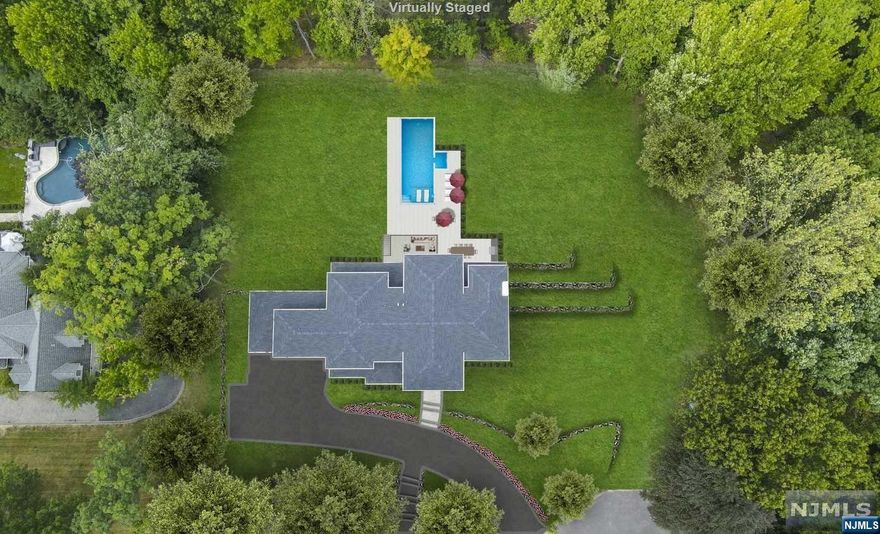PRIVATE AND SECLUDED ONE ACRE PROPERTY ON A PRESTIGIOUS CUL-DE-SAC ON THE EAST HILL OF TENAFLY! APPROX. 8,000 SFT OF LUXURIOUS NEW CONSTRUCTION DESIGNED BY TOP NYC INTERIOR DESIGNER. FIRST FLOOR: GRAND ENTRANCE FOYER, LIVING ROOM, GREAT ROOM WITH GAS FIREPLACE, DINING ROOM, GOURMET EAT-IN KITCHEN, BUTLER'S PANTRY, BEDROOM, FULL BATHROOM, POWDER ROOM, SLIDING DOOR TO DECK. SECOND FLOOR: PRIMARY BEDROOM SUITE, PRIMARY BATH, 2 WASHROOMS, OVERSIZED WALK-IN CLOSET, STUDY/OFFICE,3 ADDITIONAL EN-SUITE BEDROOMS AND LAUNDRY ROOM. LOWER LEVEL: LARGE MEDIA ROOM, GYM, BEDROOM, FULL BATHROOM, SPACIOUS RECREATION ROOM, WINE CELLAR & FULL BATHROOM, WALK OUT TO COVERED PATIO. OUTDOOR ENTERTAINING: HEATED IN-GROUND POOL WITH AUTOMATED COVER, HOT-TUB (SEPARATE HEATING TO BE USED YEAR ROUND), OUTDOOR KITCHEN AND COVERED PATIO WITH FIREPLACE. CALIFORNIA CLOSETS IN ALL BEDROOMS, 3-CAR HEATED GARAGE, 4-ZONE A/C, FULL HOUSE GENERATOR. MINUTES TO GW BRIDGE TO NEW YORK, TOP RANKED SCHOOL