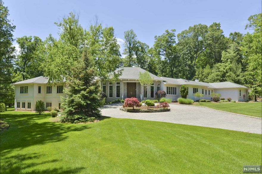 TAXES JUST REDUCED! LAND LOVERS! Almost A DOUBLE LOT @1.58 ACRES!! GORGEOUS,LEVEL & LANDSCAPED w/BRAND NEW WHITE STUCCO EXTERIOR! SPRAAAWLING RANCH of approx 6,000 s/f on main level + approx 3,000 s/f FINISHED,WALK-OUT Lower Level w/PROFESSIONAL THEATER(NYC Designer),BAR,BILLIARDS,GYM + GOLF SIMULATOR(nego)w/SLATE FLOORS gives WORKING, PLAYING & ENTERTAINING AT HOME YOUR SANCTUARY SPACE! 2-STORY OPEN FOYER, 2 story GREAT ROOM w/WALLS OF WINDOWS & MULTIPLE SKYLIGHTS. BRIGHT EAST/WEST EXPOSURE! HIGH CEILINGS t/o! OPEN FLOOR PLAN! LARGE OPEN KITCHEN w/HUGE ISLAND + BRAND NEW SS DBL OVENS,DW'S +MIC JUST ORDERED! FR w/Gas Fireplace. PRISTINE HARDWOOD FLOORS! 4 BR's on Main level incl Luxurious PRIMARY SUITE w/2 GENEROUS WALK-IN CLOSETS/Fpl + a 5th BR Suite on Lower Level ** 4 CAR GARAGE! ** Double Driveways! HOME OFFICE OPTIONS! BLUE RIBBON SCHOOL DISTRICT! POOL on SITE PLAN. READY TO JUST MOVE IN!!!(built in'99/some orig foundation)UNIQUE OPPORTUNITY! PLS VIEW VIRTUAL TOUR