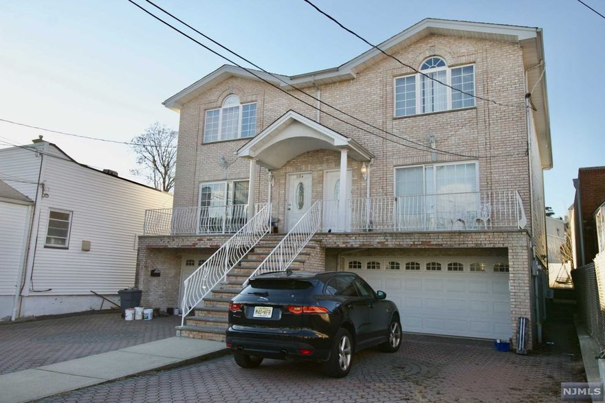 Welcome to this beautifully oversized 3-bedroom 3.5 bath duplex with approx. 2000 sq ft of living space! Spectacular location, offers all the conveniences! Easy access to NYC public transportation, restaurants & shopping. Open layout, gorgeous hardwood floors & bright skylight. Grand size living & dining area, half bath & laundry. Oversize master bedroom with 2 closets & master bath. Two additional bedrooms & full bath. Finished ground floor w/ an additional bedroom and full bath. Two car garage and a yard with a deck. An absolute must-see, property is being sold as is conditions, THIS WILL NOT LAST, make your appointments today!