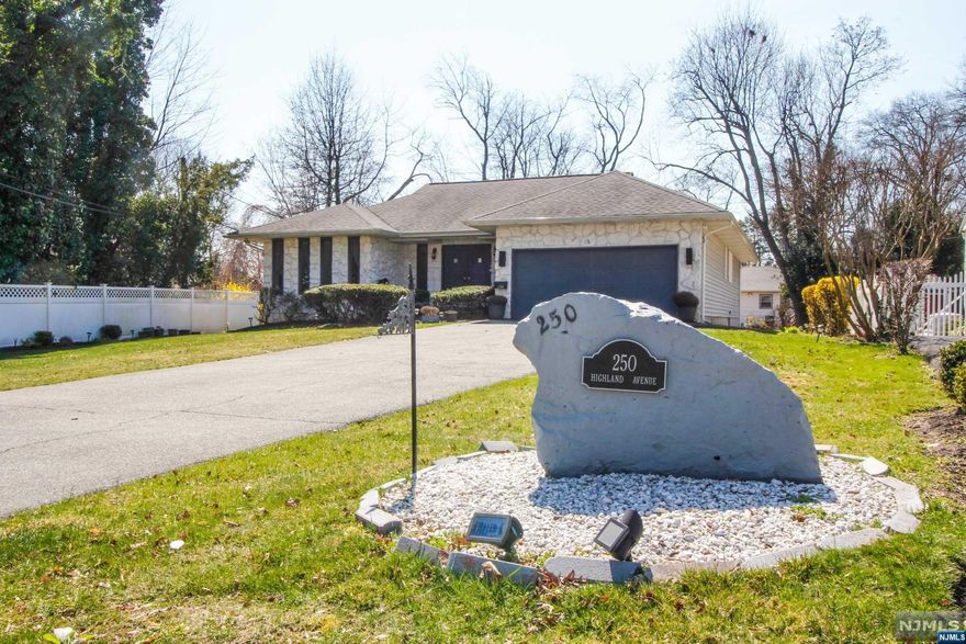 Welcome to your forever home in the coveted neighborhood of historical Seven Oaks! Beautiful stone-faced ranch with striking windows nestled on a serene sanctuary of over 11,295 Sq Ft. This 2 BR,2 full BA home boasts the perfect combo of lux and classic charm. As you enter the double doors you're greeted with a generous size living room with skylights, cathedral ceiling, and a gorgeous wood burning FPLC with blower that aids in distributing heat. Expansive glass sliding doors in addition to 2 other sets of patio doors located in kitchen and primary bedroom that all lead to lovely deck. Bright eat in kit with skylight, custom center Island and SS appliances. Huge unfinished basement with high ceilings, and ample storage. PROP is being sold strictly "As Is." Seller will not do Any repairs, incl. those requested by municipality. No known defects but, fireplace/chimney/flue is "As Is." This home is a must see! Do not be deceived by the # of BRs. Home can be easily modified!