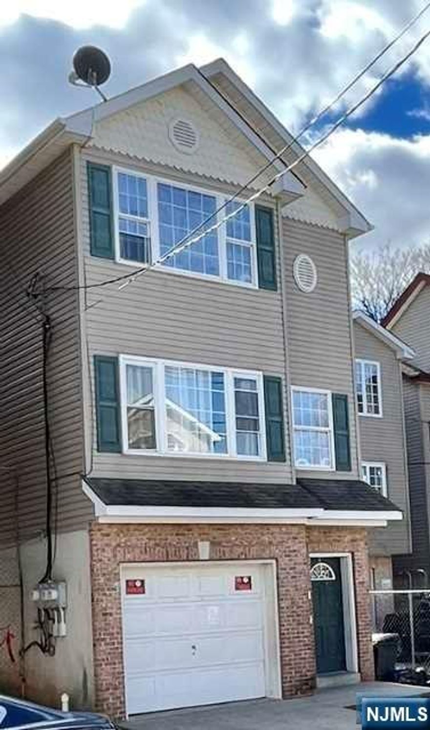 Two family house, less than 15 years old, Every level offers, 3 bedrooms , 2 full baths (nice size master bedroom). living room/kitchen combo. Hardwood floors, central air central heat.All separate utilities. Family room and half bath and laundry room with a separate entrance. Both units are rented , owner willing to give tenant notice to move out once commitment is finalized.