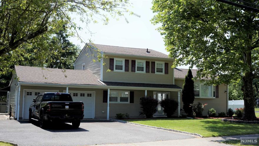 Well Maintained 4 Bedroom - 2.5 Bath split-level fully renovated in 2008 situated on .379 acres. Close to NYC transportation, schools, shopping, restaurants, & major highways. First floor bed room and office , Eat-in Kitchen with a breakfast bar, granite counter top and pantry. Family room off kitchen has French doors that lead to large paver patio. 3 season room overlooks private back yard. Formal living and dining rooms. The master Bedroom suite includes a full bath and walk-in closet. Two attached car garage and a four car driveway. above ground small swimming pool.