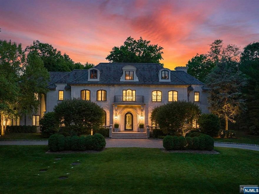 One of the finest estates in Alpine. Master Architect James Paragano & KLM's amazing interior design team created a true work of art. Imported, diamond cut limestone exterior, Vermont slate roof, oversized French Doors and Windows create sun-filled luxurious rooms. Every square inch inside & out was meticulously planned / executed and it shows. 12' Ceilings entire 1st floor. Chef's kitchen w/ 2 Subzero refrigerators, Wolf Stove, 2 Miele Dishwashers & Dacor Appliances. Elevator, Generator, Crestron Smart Control. 5 fireplaces ensconced in the finest marble. With lifts, the 3 bay garage can accommodate 5 cars. 185' x 300' flat, power gated property w/ pristine landscaping just minutes from NYC. Excellent location & extremely private. Heated gunite pool & cabana. The attention to detail is impressive. Top tier school system! See virtual tour link for a comprehensive video tour of this estate w/ room by room details, floor plans, & interactive whole-property 3D model