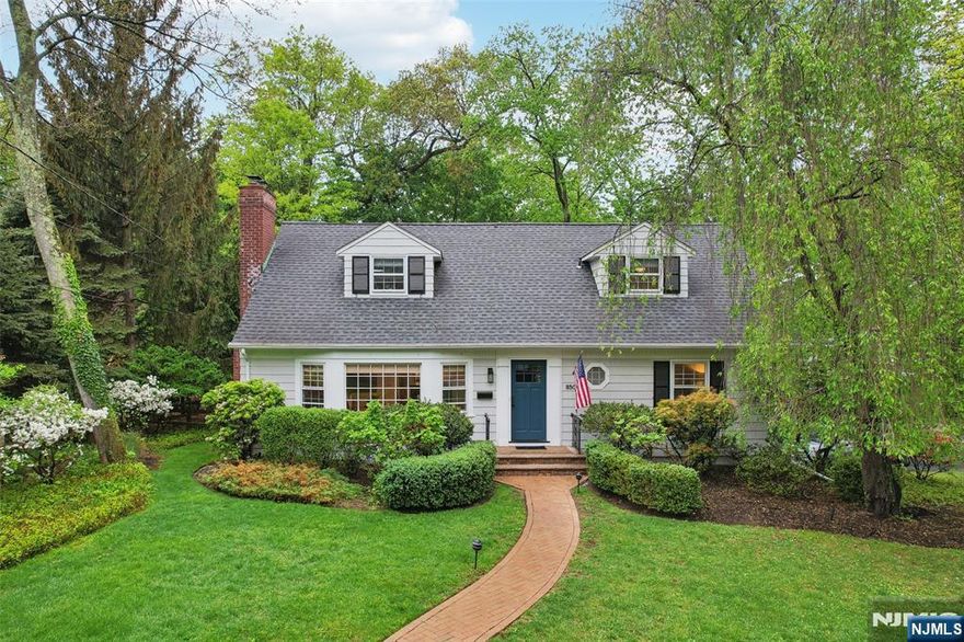 Cream Puff Willard gem with extensive renovations over the past 5 years by RTH Builders! Situated on 0.32 acres in a prestigious Ridgewood neighborhood, this turn-key 4 bedroom home combines modern updates with classic charm. The open concept 1st level features hardwood floors, a living room with fireplace and built-ins, and a modern kitchen with top-of-the-line appliances and a large center island that overlooks a dining area and bright, window-lined den. Also included on the 1st floor are 2 bedrooms and a spa-like bathroom providing added convenience for those seeking 1st floor/in-law living. Upstairs are 2 spacious bedrooms and another full bath. Additional living space in the finished walk-out basement featuring a recreation room, new laundry area, and mudroom with access to the 2-car garage. Enjoy entertaining in the spacious backyard with a patio for outdoor dining and entertaining. Close to Upper Ridgewood Tennis, NYC transit, and Willard School. Move right in!