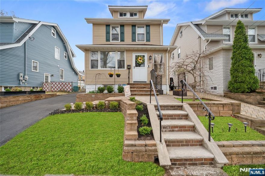 This charming Colonial is set on a quiet, one-way residential street just moments from the park and downtown. A welcoming mudroom entry leads into a spacious living room with a bright front den, perfect for home office or play area. The formal dining room offers an open feel and provides direct access to the backyard.The eat in kitchen features a cozy nook and a convenient half bath. Upstairs, there are three bedrooms and an updated main bath. The front bedroom includes access to a walk-up finished attic, offering flexible bonus space.The finished basement expands your living area with a rec room, laundry and wet bar. Outside, enjoy a fully fenced yard with a paver patio that is perfect for summer gatherings. A detached one car garage offers versatility for parking, storage or home gym.Located close to downtown Nutley, with restaurants, shops, and NYC transportation nearby.