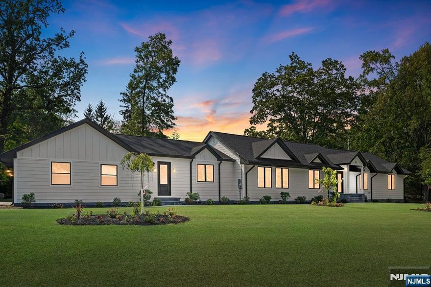 Experience elevated, single-level living in this beautifully renovated and expanded luxury ranch, tucked in Allendaleâ€™s sought-after San Jacinto Estates. This turnkey residence offers sophisticated comfort with premium upgrades throughout, including engineered hardwood floors, 2-zone central air and heat, built-in speakers, under-cabinet and niche lighting, and more. The open-concept layout is perfect for modern living, featuring spacious living and dining rooms, a stunning custom kitchen with a massive island, walk-in pantry, and a cozy family room with a fireplace and built-insâ€”all seamlessly opening to a paver patio for easy indoor-outdoor entertaining. Enjoy the flexibility of two private primary suites with en-suite baths and walk-in closets, plus two additional bedrooms and a full hall bath on the main level.The expansive finished lower level includes a large rec area with a bar, a fifth bedroom, full bath, home office, theater room, and ample storage. All located in a beautiful neighborhood with top-rated Allendale schools luxury and lifestyle meet here.