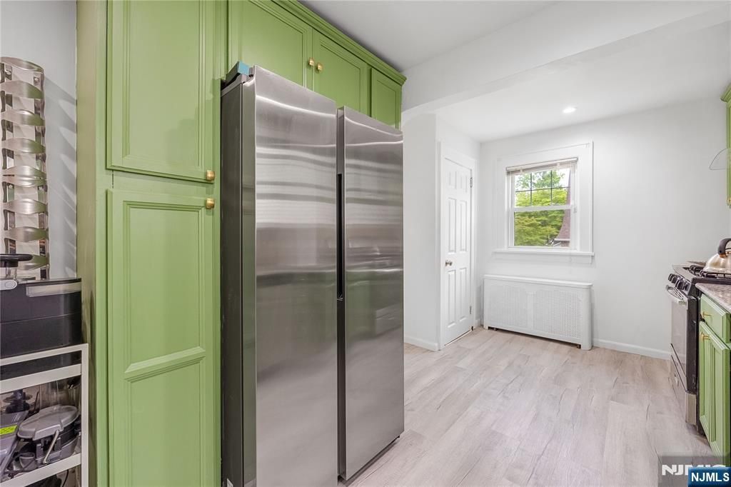 Photo of 384 Woods Road, Teaneck, NJ 07666 (MLS # 26014254)
