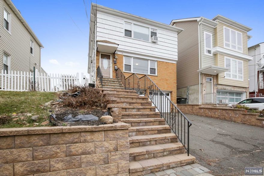 Become your own Landlord!!! This newly updated two family has 6 rms, 3 bed rms & 1.5 baths on each floor, 2 car, move right in!! Let your tenants help pay your mortgage.