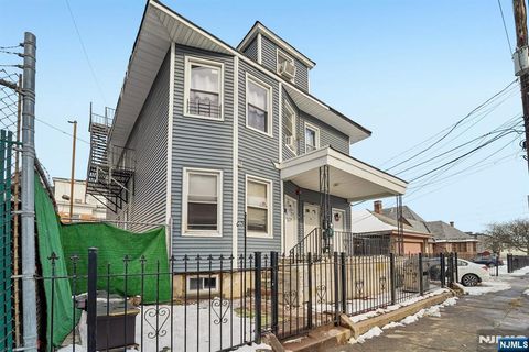 Photo of 363 Van Houten Street, Paterson, NJ 07501 (MLS # 25043528)