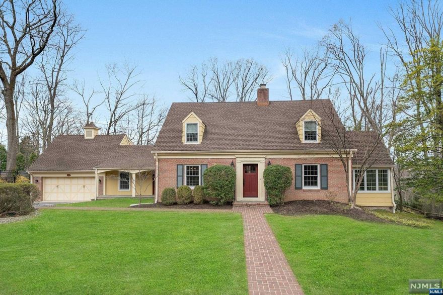 Nestled on 3/4 acres of land, this impeccably renovated home boasts GRAND VIEWS of the sunset & mountains, creating the perfect backdrop for a unique living experience that seamlessly combines indoor comfort w/ outdoor serenity. 1st level showcases newly installed hardwood flrs & kitchen equipped w/ a center island & access to an upper-level patio. Additionally, there's a family room, living room adorned w/ a gas fireplace & elegant mantle, a den/office w/ new slate flooring & a powder room. 2nd flr, has a primary bedroom accompanied by a spa like bath, along w/ 2 additional bedrooms. A hallway bathroom completes this level. The 4th bedroom, located above the garage & featuring a full bath, offers versatility as a guest room or au pair suite. The finished lower level has high ceilings & features a family room complete w/ a wet bar, full bathroom, laundry room & storage. Accessible from this level is a 2 tiered lower level patio. Attached 2 car heated garage.