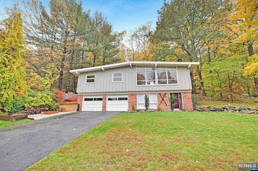 This is the home you've been waiting for. Nestled in a quiet neighborhood within an optional lake community (Erskine OR Cupsaw!), you will find the perfect 3BR 2Bath home. The main floor boasts an open floor plan with giant windows overlooking mature trees, with a cozy fireplace to warm the nights. The dining room has sliders to the peaceful and private deck for easy entertaining. The kitchen offers ample cabinets and counter space, w/ bar overlooking the LR. 3 generous sized BRs follow, with the MB offering a FB, WI closet, and deck access. An oversized 2 car garage and den welcome you downstairs. Newer septic (2017), Central Air and Furnace (2019) mean you can just unpack and settle into this wooded escape for the winter ahead.