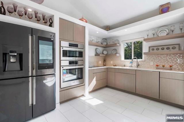 Photo of 531 Chestnut Place, Teaneck, NJ 07666 (MLS # 26019620)