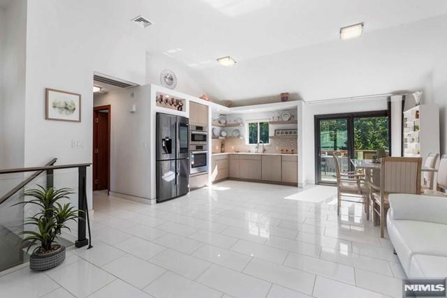 Photo of 531 Chestnut Place, Teaneck, NJ 07666 (MLS # 26019620)