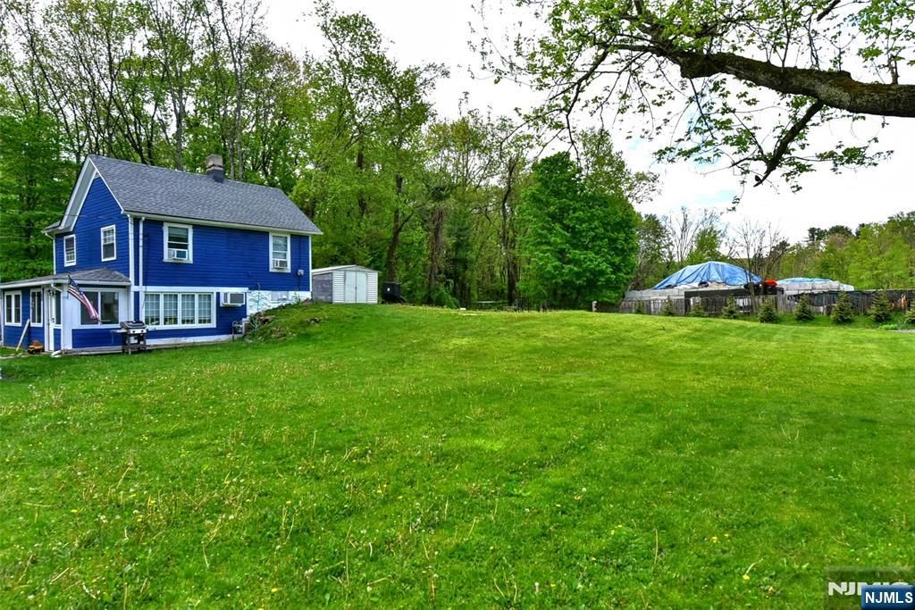 Photo of 42 Kanouse Road, West Milford, NJ 07435 (MLS # 26018517)