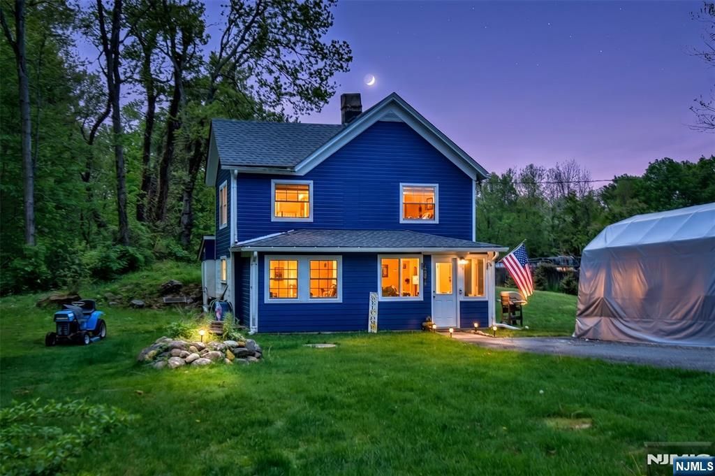 Photo of 42 Kanouse Road, West Milford, NJ 07435 (MLS # 26018517)
