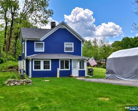 Photo of 42 Kanouse Road, West Milford, NJ 07435 (MLS # 26018517)