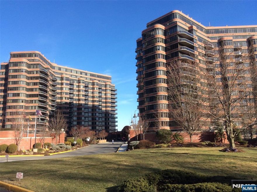 Conveniently located,luxturyCarlyle Towers,white-gloves residence.Wellmaintained apartment,unobstructed New York City & river view from living room and the bedroom,private back yard.Building has 24 Hr Concierge,Resort style amenities,Palisadium health club membership,valet parking,one indoor parking included, outdoor swimming pool,library dry cleaner on premises, ease to commute to nyc buses,shuttle to ferry. *****must see***