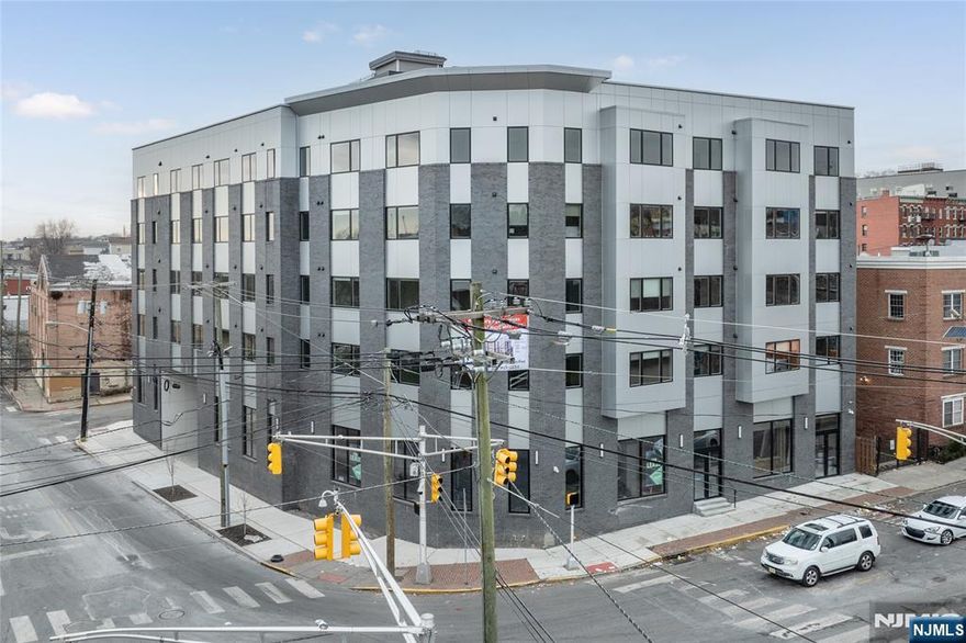 Unit 201 spans a spacious 788 square feet, featuring a well-appointed 1 Bed, 1 Bath layout designed w/ comfort & functionality in mind. The bathroom includes a bathtub & shower combination. The kitchen boasts high-end SS Frigidaire appliance package, including a five-burner gas range w/ an oven, a microwave w/ an integrated exhaust system, a top-freezer refrigerator, & a dishwasher. A quartz countertop peninsula offers a stylish breakfast bar, creating an inviting space for casual dining. To further enhance daily living, each unit comes equipped with a full-size Samsung washer/ dryer w/ a moisture sensor, promoting efficiency & convenience.