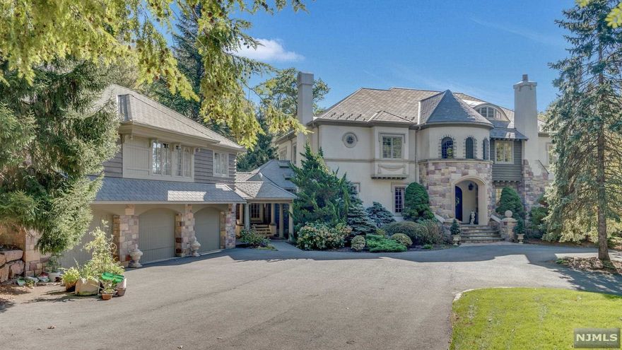 Magnificent custom built estate located in one of the most sought after areas in town! Only approx 20 miles from Manhattan, yet in an oasis of your own. Just under 8700 sq ft of living space, not including the large basement, 2 bedroom carriage house and bonus room over lower garage. Lots of gorgeous detail throughout, including hand carved woodwork, pocket doors and hand painted ceiling. Kitchen once featured in KBB Magazine highlights "3 islands for 3 functions: prep, dining and display"! Quality materials used in the grand kitchen such as bleached maple, granite, mahogany and African slate. Gorgeous family room w wet bar and fireplace where crowds can gather. Stunning library w amazing woodworking. Light filled master bedroom with terrace overlooking spectacular backyard. Bring your coffee! Breathtaking grounds, great for entertaining: beautiful gunite pool w diving board and waterfall, tennis court and lots of lush land. Don't miss this incredible opportunity!