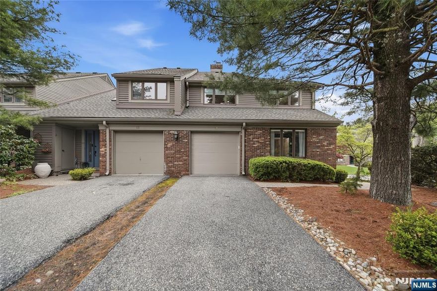 For a private showing please call 201-647-4225. This beautifully decorated home feels like it came straight out of a magazine and is truly one of the most updated and impressive townhomes ever offered in Brookside Manor. Designed with both style and functionality in mind, this well-laid-out home offers exceptional flexibility throughout. The first floor features a versatile flex space that can serve as a home office, den, or even a fourth bedroom, complete with access to an updated full bath. The modern kitchen is a standout, showcasing an island, quartz countertops, and a seamless flow into the spacious dining area and inviting family room with a gas fireplace-perfect for both everyday living and entertaining. Sliding doors lead to a large deck, making indoor-outdoor gatherings effortless. Upstairs, a generous loft provides the ideal space for a home office, reading nook, or cozy sitting area. The primary suite feels custom-designed with a stylish shaker accent wall, a beautifully updated bath with a double vanity and large walk-in shower, and a spacious closet ready for personalization. 3 additional bedrooms and an updated full bath complete the second level. The finished basement adds even more living space, ideal for a playroom, gym, or additional family room. Enjoy a prime location near the pool, tennis and pickleball courts, and clubhouse. Experience all that Mahwah has to offer, including its low taxes, abundant open space, and convenient access to major highways.