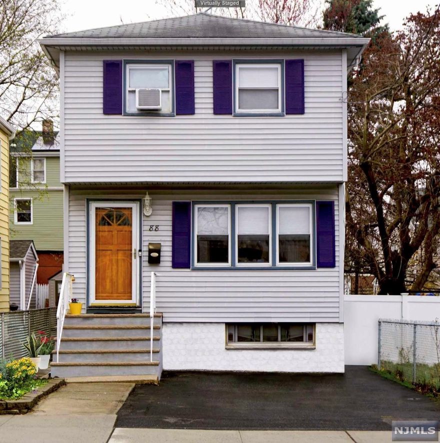 Beautiful Colonial features great open floor plan! This home is truly loved and enjoyed by the current owner - with a nice size living room, very spacious dining room, beautiful kitchen with granite counter tops and breakfast bar! Outside exit to deck and yard make this home great for entertaining inside and out! Living Room and Dining Room feature gleaming wood floors and crown molding. The Master bedroom is very large and has a spacious closet, two additional bedrooms and update bath complete the second floor. The basement features a rec room, office, laundry, full bath & utilities. Driveway affords off street parking which is a plus. Fenced in yard and great convenient location - walk to park & more!