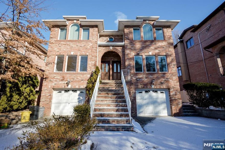 Immaculate & Renovated Bi-Level in Prime Palisades Park Welcome to this impeccably updated and expansive bi-level home in the heart of Palisades Park. This move-in-ready residence provides exceptional flexibilityâ€”perfect for multi-generational households, or todayâ€™s work-from-home lifestyle. The main living level features a bright, open layout with freshly painted interiors, professionally refinished hardwood floors, and brand-new light fixtures throughout. Sun-filled Living and Dining areas flow seamlessly into the modern kitchen, featuring brand-new appliances, a new contemporary faucet, new countertops and a newly installed backsplash for a clean, updated look. Step outside from the kitchen onto the uncovered deck, ideal for morning coffee or casual entertaining. This level offers three spacious bedrooms and two full bathrooms, for comfortable one-level living. The expansive ground level provides outstanding versatility and privacyâ€”ideal for a home office setup, guest suite, in-law space, or recreation area. This level features brand-new tile flooring throughout, a large Recreation Room, two additional dens perfect for remote work or guest rooms, a third full bathroom, and a separate basement entrance. A built-in 1-car garage adds everyday convenience. Additional upgrades include new plumbing valves at all water fixtures and a brand-new garage door, offering peace of mind for years to come.