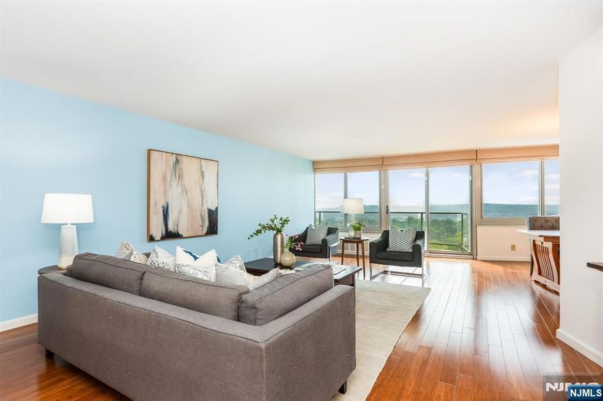 This spacious and bright updated one bedroom unit at the Claridges offers a beautiful open flow with spectacular year round views from your own private balcony! Large rooms, bamboo flooring, updated bathrooms and a spacious kitchen with stainless appliances and plenty of storage make this condo a perfect spot to call home. Additional perks include a huge Primary suite with walk in closet and spacious bath with a walk in shower and bench, in unit laundry, large windows and plenty of closet space. Residents of the Claridges community enjoy incredible amenities including an outdoor pool, tennis courts, fitness center, community room, 24/7 concierge/doorman and valet parking. Don't miss this one!