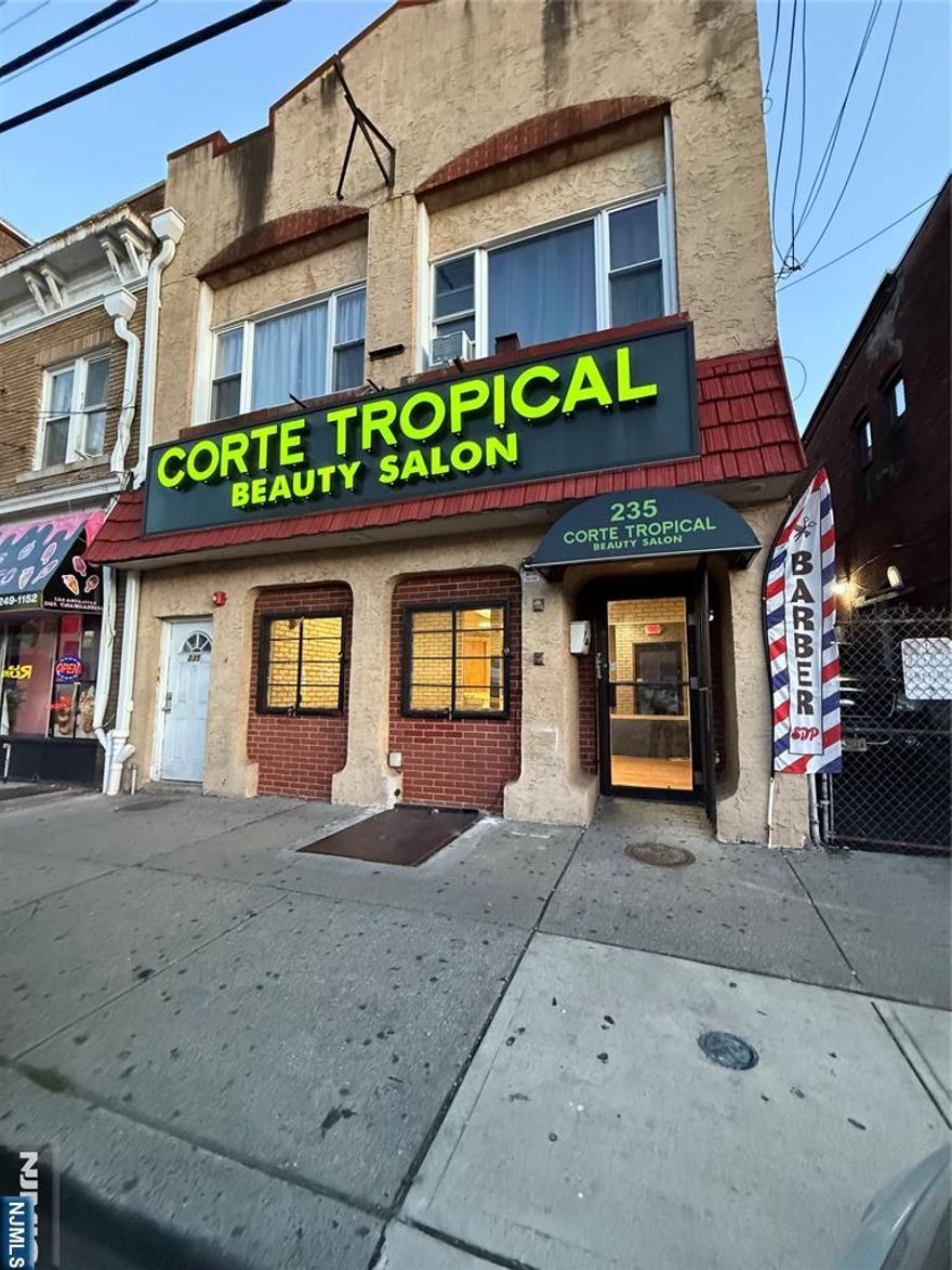 Prime storefront commercial space of approximately 1,210 sq. ft., previously a beauty salon for over 50 years. Features central air/heat, a private bathroom, and excellent building signage for visibility. Located in a high foot-traffic area near public transportation and major highways, offering great exposure and accessibility. Ideal for retail, professional office, or service-based business. Bring your vision and make this iconic location your own!