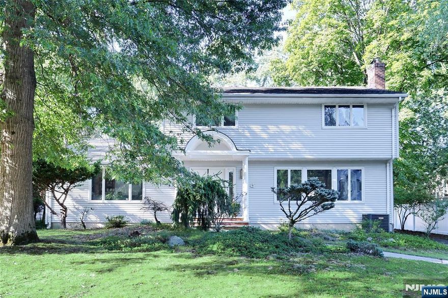Welcome to this Well-Kept Center Hall Colonial situated in a Prime Location in town! 2520 SF of Registered Living 1st & 2nd Fl Area that has a bit of Contemporary Stylish Layout plus Beautifully Finished Full Basement. 1st Fl has Inviting Entry Foyer, Large Living Rm w/FPL, Formal Dining Rm, Sun-filled FR Area and Huge Modern Kit with Center Island, Deck, Open View to Backyard looking through Floor to Ceiling Windows, 4th Br, Fbth, Powder Rm, Bright Meeting/Office Rm completes Main level. 2nd Fl has MBr w/Mbth, 2 Good sized Br and Fbth. Full Size Basement has Large Family Rm, Play Rm, Laundry and Utility Rm. House has 2 Zone Heating, Central AC, Skylights, Private Backyard, Open Porch, Hardwood Floors on Main Levels, Carpeted in Basement. Quiet Street, Located close to top-rated Demarest elementary and middle schools, Bus to NYC. Enjoy the good vibe this house offers!