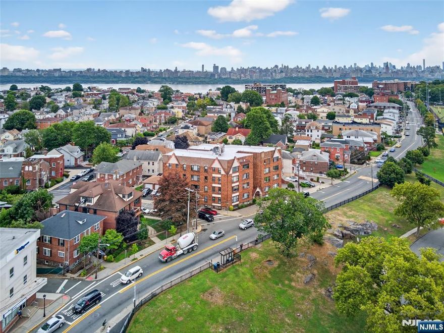 Amazing opportunity to buy this turn of the century brick and stucco home located right at the foot of James J Braddock North Hudson County Park. This 3,182 SF home was originally built as a side by side 2 family home boasting 9' ceilings on the first floor and hardwood floors throughout. There are 2 gas meters, 2 electric meters, and 2 water meters (one of which is disconnected). It has since been converted to a single family home, but could easily be converted back. The second staircase to the 2nd floor is still existing, although it has been closed. There are two defined basements. Both basements provide access to the backyard through bilco doors. . . And one of the sides has access to a finished attic. Although currently there is no curb cut, there is room for a private driveway behind the home. The home needs work, but the potential is endless. The bus stop to NYC is directly across the street, and this residence is in close proximity to restaurants, banking and recreation. The home is located in the RB Zone: Moderate Density - One and Two Family. It is adjacent to the R-C zone: Medium Density Three To Six Family. There is a zoning map in the pictures for reference.