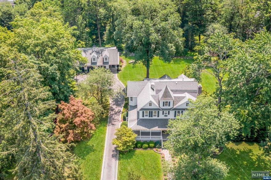 VICTORIAN ELEGANCE REIMAGINED FOR MODERN LIVING on 2 ACRES IN ALLENDALE! Your once-in-a-lifetime opportunity to own a piece of architectural history is now on market,METICULOUSLY RESTORED & DESIGNED. Be welcomed to this magnificent residence by stone walls & a holly lined walkway inviting you to the perfect porch.Enter into an impressive Parlor w/original fireplace & a staircase adorned w/custom balusters. Enjoy the main GreatRoom boasting a stone fireplace & wood beams. The adjacent kitchen incorporates such high-quality finishes, custom cabinetry & top-of-the-line appliances, seamlessly integrated into the most classic design. Entertain in the formal dining room or outdoors on the screened porch & stone patio w/BBQ. Second floor offers a tranquil retreat in the Primary Suite w/two walk-in closets & luxurious Bathroom, an additional Ensuite plus two more Bedrooms & Bath. The EXTRAORDINARY CUSTOM-BUILT 3-CAR GARAGE highlights 2nd floor 25'X 29' GAME ROOM w/Bath! Dream come true...