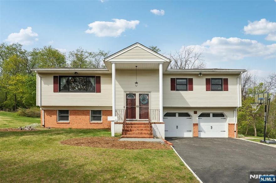 "Loving life on Laurel Court!" EPIC one of a kind 5 BR updated MOVE IN READY Bi Level with over 3700 ft of living space! Open floor plan with Formal LR and DR, luscious Gourmet Kitchen with S/S appliances and granite countertops, Double Wall Oven, Island and breakfast room with Palladium windows and skylight that also doubles as a state of the art WALK IN PANTRY area w/cabinetry and tons of work space! Oversized BR"S and closet space! Primary en suite with jacuzzi tub and walk in closet.Remarkable Ground level walk out with lots of natural light boasting a Family Room, Rec Room and Office/or potential 6th BR in law suite w/ full bath. Laundry room and garage entrance also located on ground level. Hardwood Floors,Recessed lighting. Back yard with patio backs up to Lenape Trail providing privacy and lush landscape for your serene oasis. Close to NYC bus and train, schools, shopping and restaurants and the reknown Verona Park and Community Pool.! Home Sweet Verona...you wont be disappointed!!