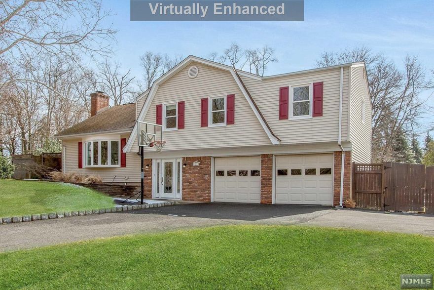 THIS RENOVATED, & UPDATED CUSTOM BUILT 5 BEDROOM 3 BATH SUGAR MAPLE SPLIT LEVEL HAS ALL THE FEATURES YOU HAVE BEEN SEARCHING FOR! LOCATED ON A CUL DE SAC OF BEAUTIFUL HOMES, IT SITS ON A SPACIOUS & PRIVATELY FENCED .39 ACRE LOT, WITH AN IN-GROUND POOL & LOTS OF ROOM FOR ENTERTAINING & RECREATION. THE ENTRY FOYER LEADS THROUGH FRENCH DOORS TO THE FAMILY ROOM WITH UPDATED FULL BATH & FRENCH DOORS TO THE REAR PATIO, IMMENSE YARD & IN-GROUND POOL. THE MAIN LEVEL FEATURES THE HUGE LIVING ROOM WITH BOW WINDOW & FULL WALL BRICK FIREPLACE, PERFECT FOR ENTERTANING. THE KITCHEN WITH QUARTZ COUNTER TOPS & STAINLESS APPLIANCES, FLOWS TO THE DINING ROOM, WHICH OVERLOOKS THE REAR PROPERTY. ENJOY THE EXQUISITE HARDWOOD FLOORS THROUGHOUT THIS SPECTACULAR HOME. 5 SPACIOUS BEDROOMS, INCLUDING THE PRIMARY SUITE/PRIMARY BATH, PLUS A MAIN BATH. 2 CAR GARAGE..TOP RATED SCHOOLS, AN EXCELLENT TOWN LIBRARY, & AN EASY NYC COMMUTE WILL ENTICE YOU! EXCEPTIONAL VALUE, GREAT CURB APPEAL, GREAT LIFE STYLE!