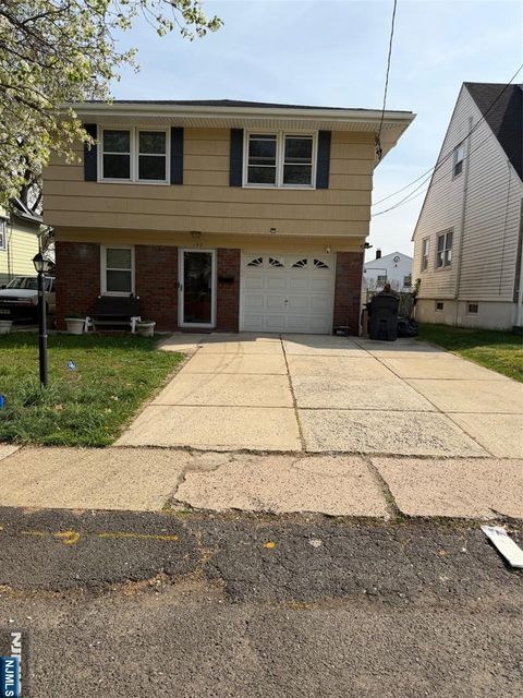 Photo of 102 Harcourt Ave, Bergenfield, NJ 07621 (MLS # 26012900)