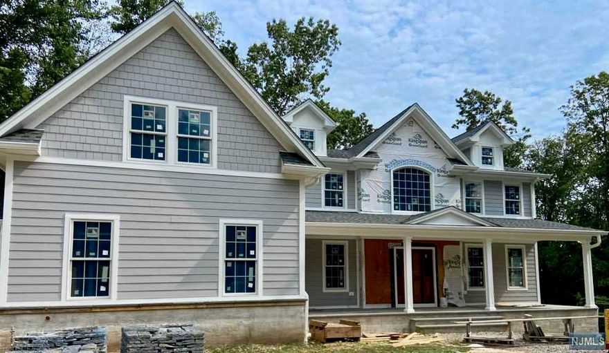 Premier Quality New Construction Designer Colonial Farmhouse 4-Bedroom Home approx. 6,700 sq. ft. on private lot! Dramatic 2-story foyer leads to a Formal Dining Room & Living Room/fireplace. The Gourmet Eat-in Kitchen with custom cabinetry, center island & premier appliances, Family Room/fireplace, Study & Mudroom/Laundry Room complete the impressive main level. The 2nd floor boosts an incredible Master Suite, spa-like Master Bathroom with steam shower & large walk-in closet, Bedroom, Bathroom & 2 Bedrooms sharing a Bathroom complete the 2nd floor. Fabulous full finished Walk-out Basement with daylight windows - game room, gym, full bathroom, wine cellar & outside patio area. Front porch with stone & Hardiplank exterior siding, 2 decks, hardwood floors, crown moldings, Anderson windows, multiple furnaces/ACs, 3-car garage & generator hook up. Desirable location! Private cul-de-sac, convenient to Rt. 208 & close to 'Maket Basket' & 'High Mtn Park Reserve'.