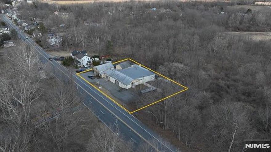 INCLUDES ALL EQUIPMENT! See Equipment List in attached documents. 9,108 SF light industrial /garage building. Original section built in the 1800s with additions since the late 1980s. The building and improvements are in impeccable condition. The garage and work areas are meticulously kept and organized. Gravel parking area for storage or vehicles or loading. Heavy power and a first class spray booth for painting. Very good visibility on Route 46 with over 200ft of frontage. Septic. Clean Environmental Report. Concrete slab construction with a mix of metal roofing and shingles/second floor office space.