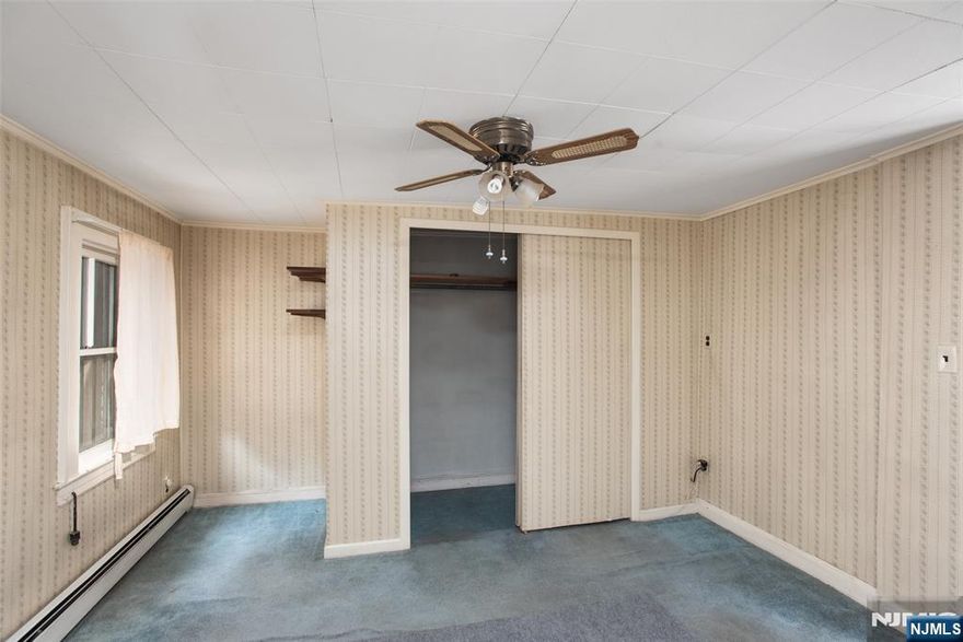 Opportunity to own this two-family property in Newarkâ€™s most desirable "Ironbound" section; just minutes to Penn Station the Prudential Center, numerous shops and restaurants. This home has been cared for by the same family for over 100 years and it's ready for its new owners. The main floor offers a living room, dining room, kitchen, bedroom and bath. The second floor features a kitchen, bath and three additional rooms. The third floor has two more rooms as well as storage. Additional features include a full unfinished basement with laundry and a private driveway leading to the oversized 2-car garage. This home maintains all of its original detail and charm and is ready for a fresh start for either families or as an investment property.